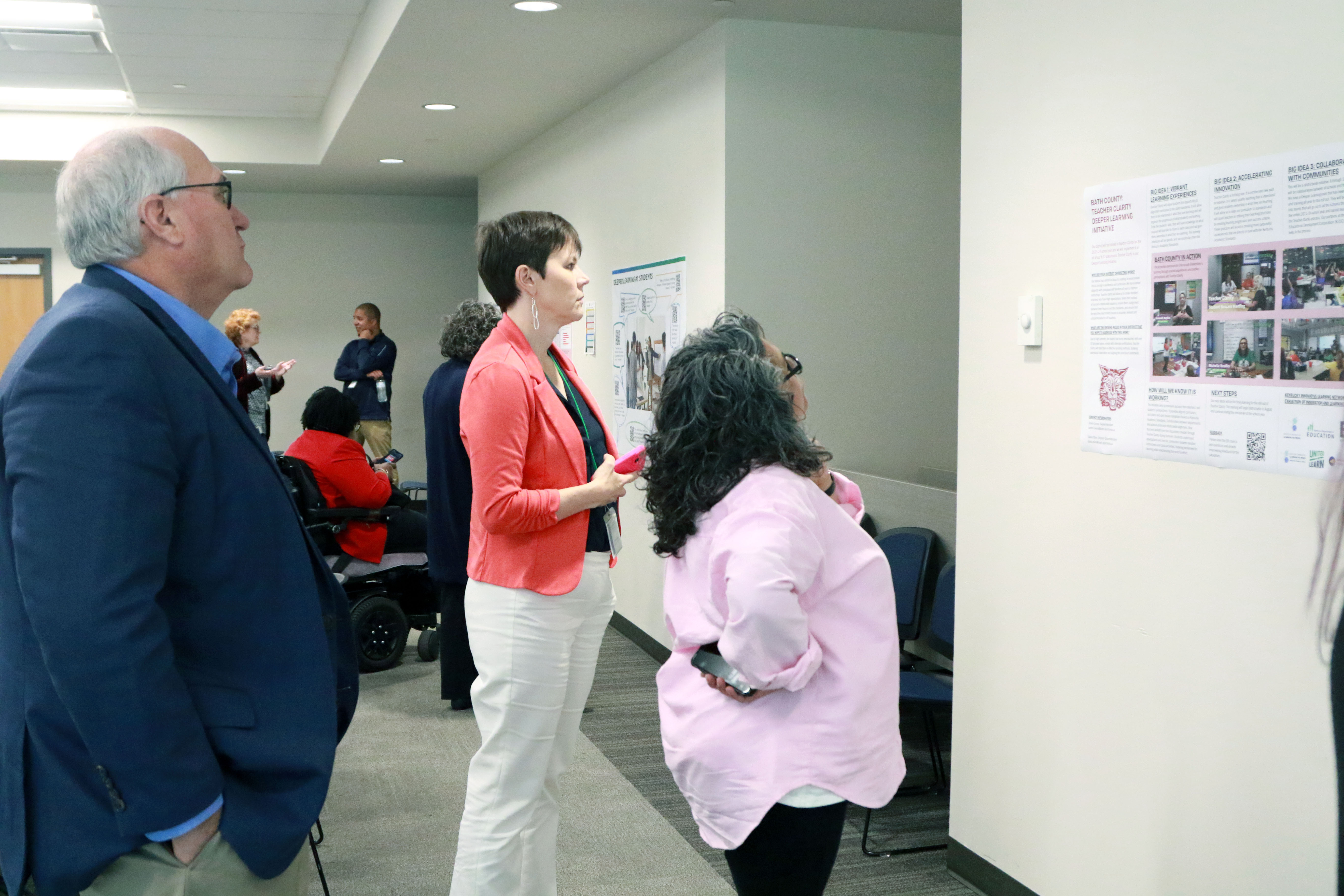 April KUWL convening members review the feedback posters for prototype 2.0