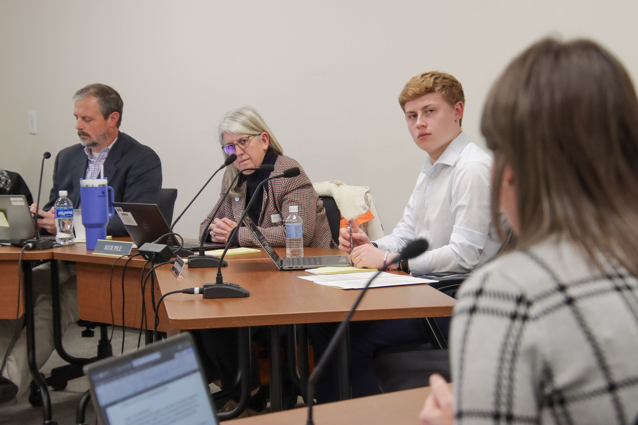 Kentucky Board of Education members, including student member Preston Graham, are seated during a board meeting presentation.